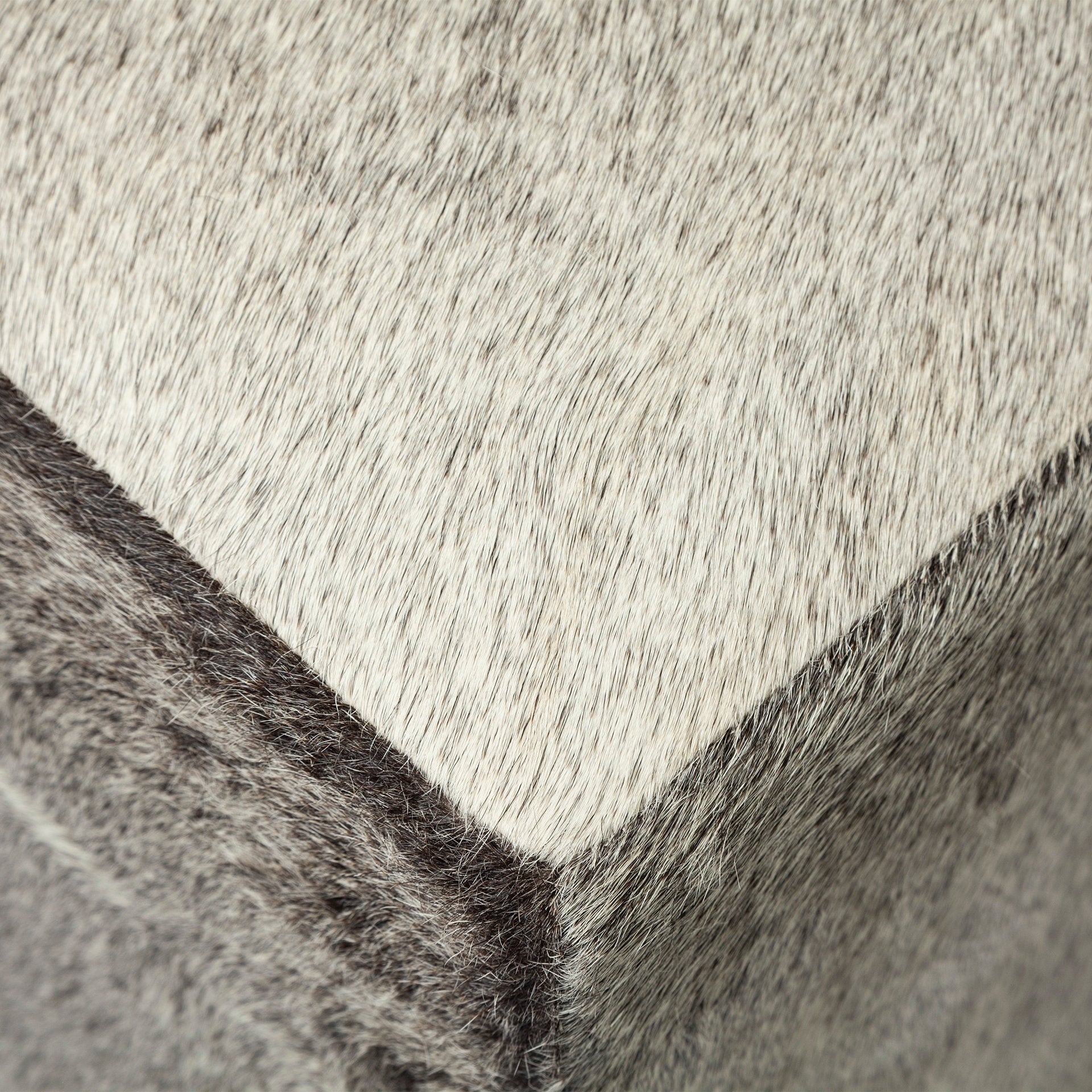 Zahavi I 20" Grey - toned hair - on - hide ottoman - Central Designs