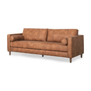Loretta 88.0L x 36.2W x 33.9H Cognac Brown Faux Leather Three Seater Sofa with Two Bolster Cushions - Central Designs