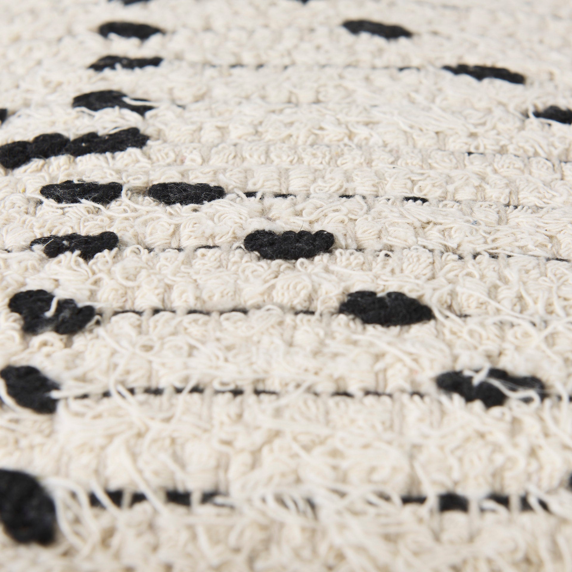 Aarohi 16.0L x 16.0W x 16.0H Cream/Black Cotton Patterned Pouf - Central Designs