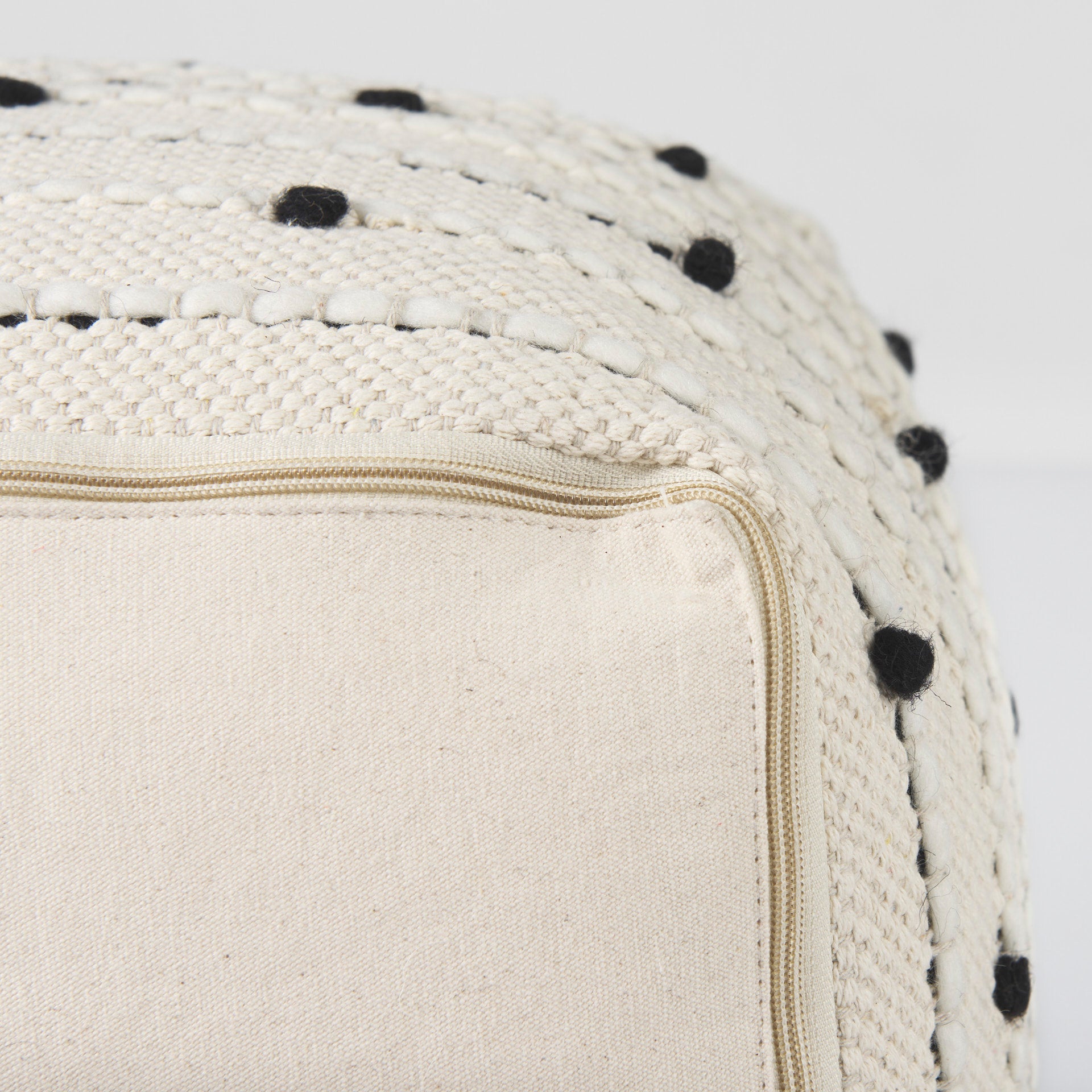 Amaira 16.0L x 16.0W x 16.0H Cream/Black/White patterned Wool and Cotton Pouf - Central Designs