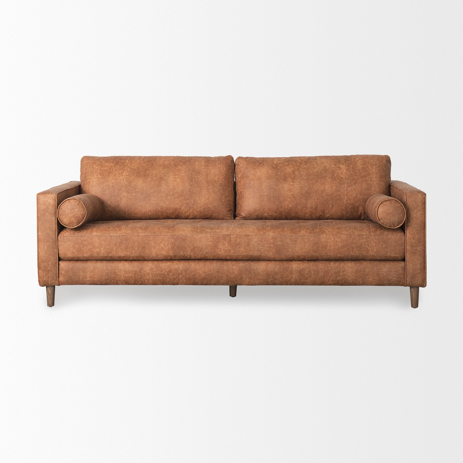 Loretta 88.0L x 36.2W x 33.9H Cognac Brown Faux Leather Three Seater Sofa with Two Bolster Cushions - Central Designs