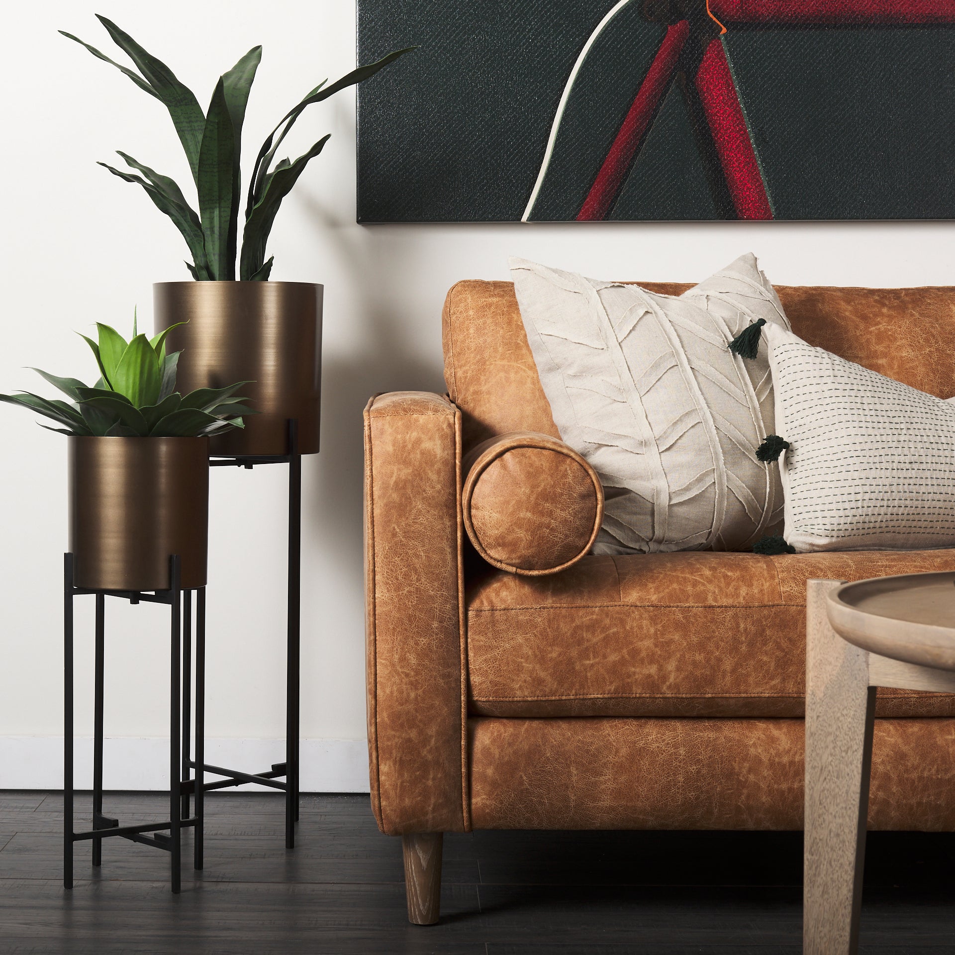 Loretta 88.0L x 36.2W x 33.9H Cognac Brown Faux Leather Three Seater Sofa with Two Bolster Cushions - Central Designs