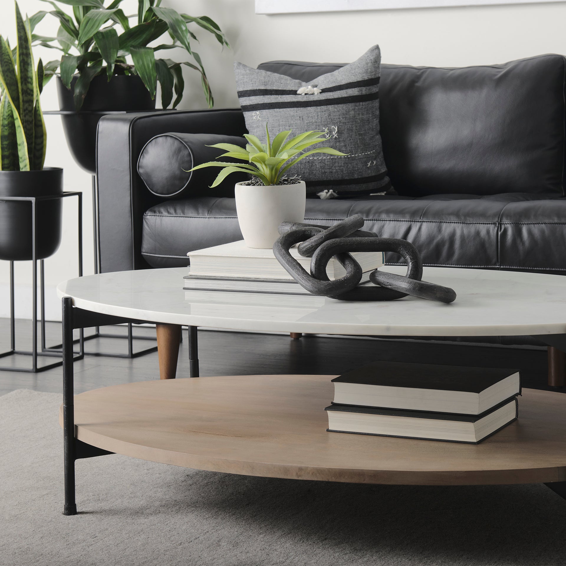 Larkin 48" Oval White Marble Top and Solid Wood Shelf w/ Black Metal Frame Coffee Table - Central Designs