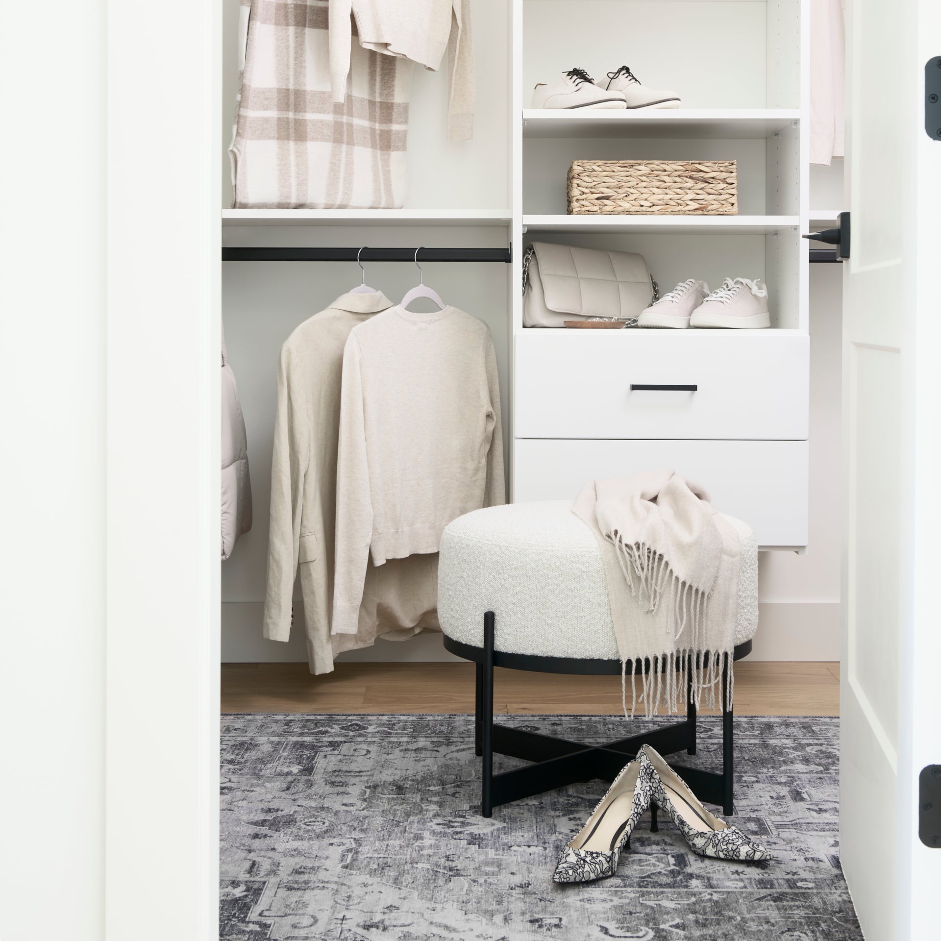 Amelia Cream Boucle W/Black Metal Upholstered Pouf - Central Designs