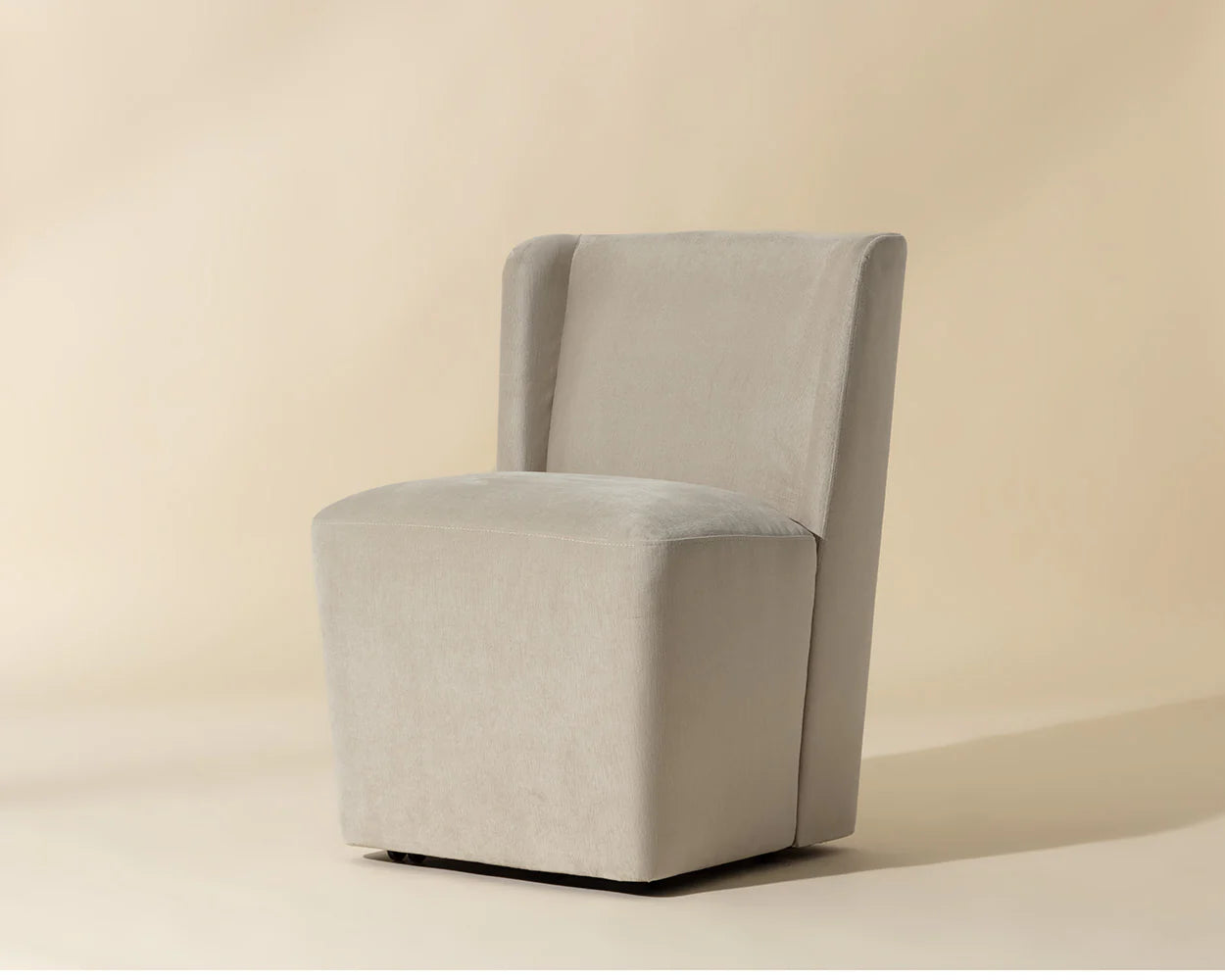 Amita Wheeled Dining Chair - Piccolo Prosecco