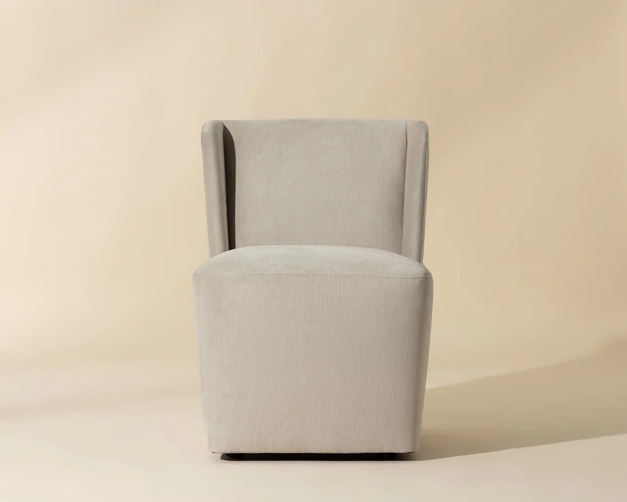 Amita Wheeled Dining Chair - Piccolo Prosecco - Central Designs